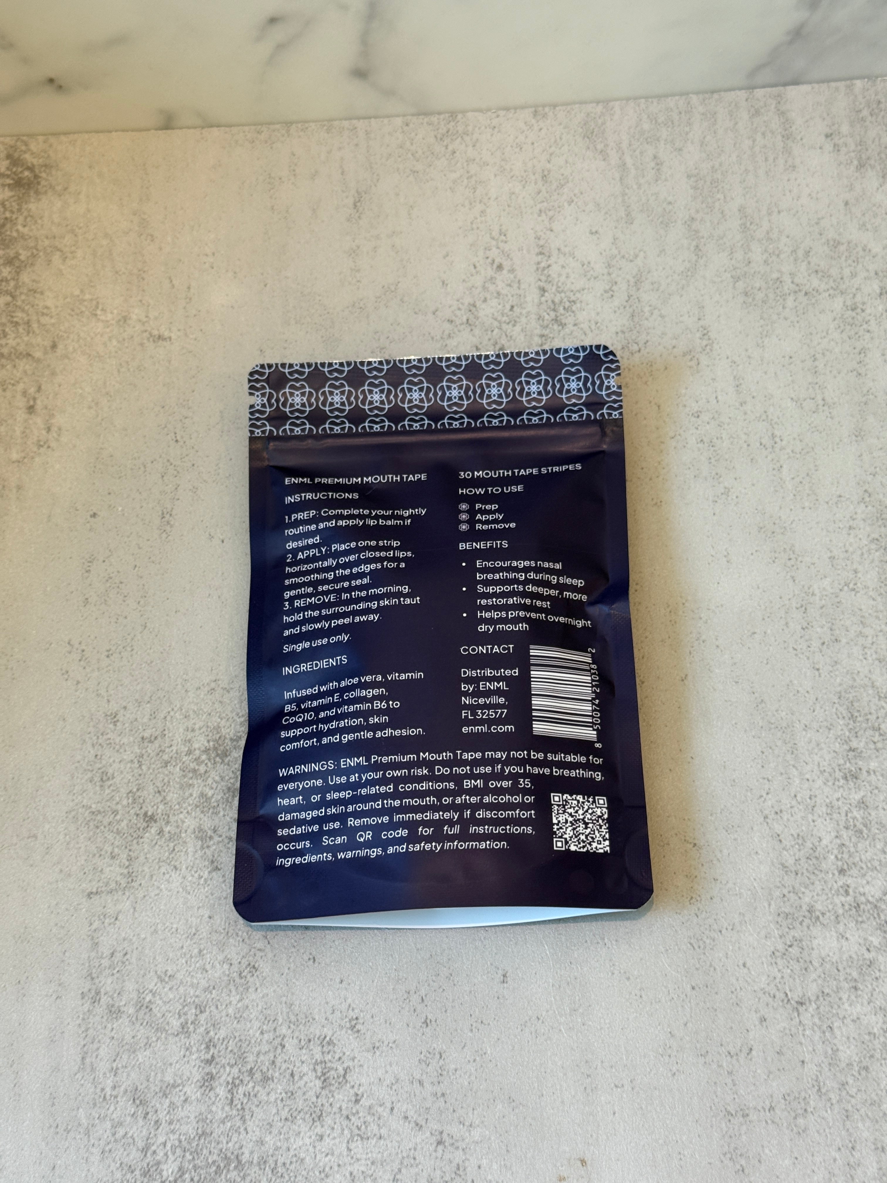 ENML Mouth Tape back of package - instructions, ingredients (aloe vera, collagen, CoQ10, vitamin B5, vitamin E), benefits for nasal breathing and sleep