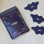 ENML Premium Mouth Tape pouch front view on marble - 30 collagen mouth tape strips for better sleep
