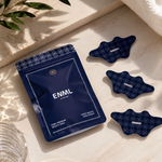 ENML Premium Collagen Mouth Tape pouch with mouth tape strips on marble surface - dentist-designed nasal breathing tape for sleep