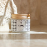 ENML Whitening Toothpaste Tablets jar on marble surface - fluoride-free hydroxyapatite whitening tablets with gold lid